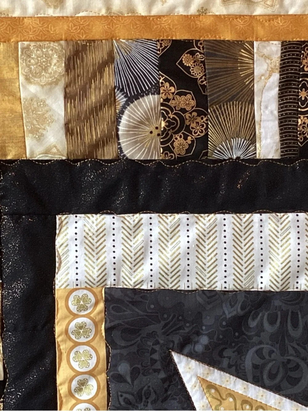 NWT. Gold and Black Star Lap Quilt